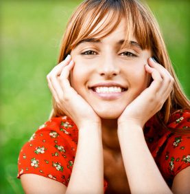 Woman from Lewisville with porcelain veneers.