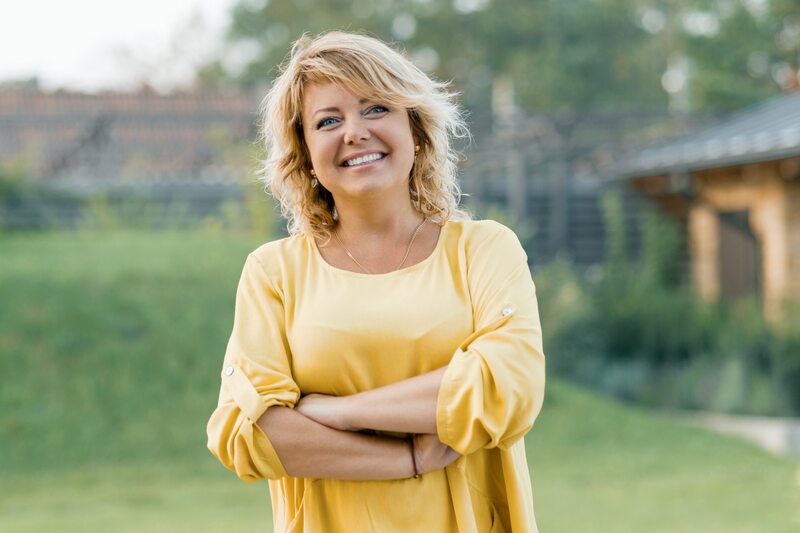 Smiling woman shows off her smile