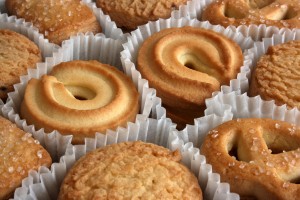 A tin of Danish butter cookies, a common holiday treat that may damage teeth.